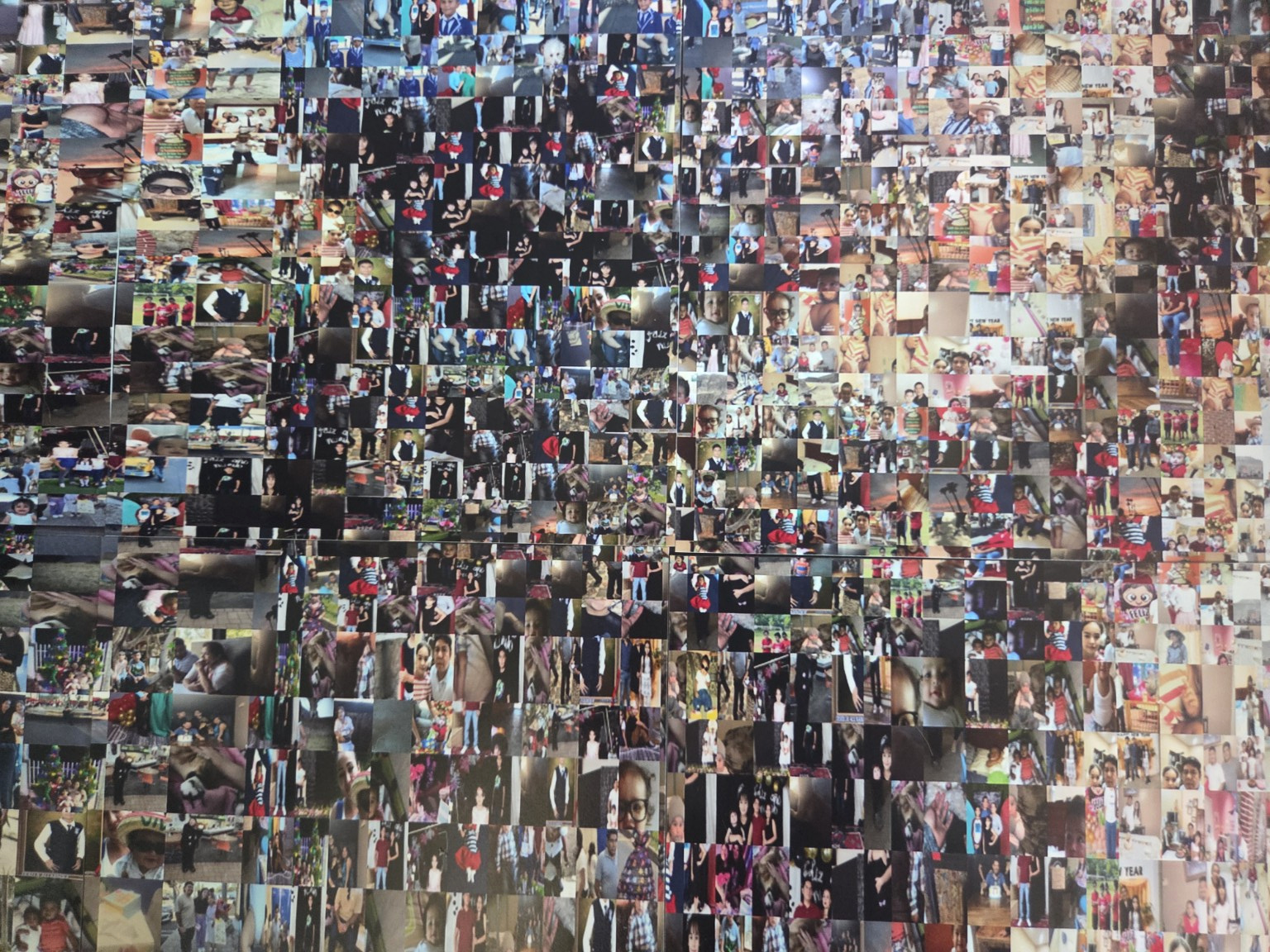 Close view of the individual family photographs making up the mosaic
